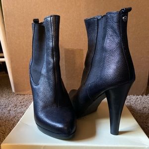 Michael Kors black leather ankle boot. 4 1/2” heel. 1/2” platform. Size 9.5 M